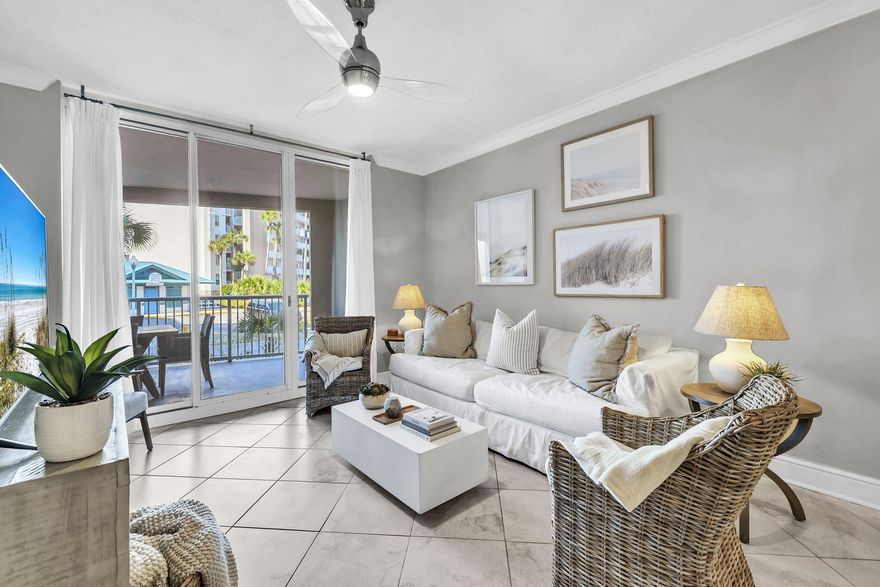 This beautifully situated 3-bedroom, 2-bath condo offers convenient first-floor living with effortless access to the Gulf -- just steps from the emerald waters and sugar-white sandy beaches.

Azure is a truly special destination where you and your family can create unforgettable memories. Designed for both relaxation and recreation, the community features two sparkling pools, two hot tubs, a well-equipped fitness center, and, most importantly, direct beach access just moments from your door. Enjoy the convenience of being within walking distance to the boardwalk, featuring the Gulfarium, restaurants, and a variety of shops.

Whether you're enjoying a peaceful morning by the water or a fun-filled day in the sun, this coastal retreat delivers the perfect blend of comfort, convenience, and coastal lifestyle.