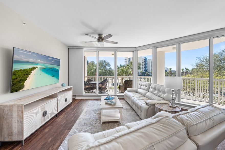 Discover coastal elegance in this gorgeous luxury end-unit condo in the exclusive St. Lucia building at the Silver Shells Resort in Destin where over 1000 feet of private beach with turquoise water and sugar white sand await. Perfect for a permanent residence, beach getaway or short term rental, St. Lucia 306 features calming coastal colors and decor, luxury LVP flooring throughout, quartz countertops, stainless steel appliances, modern lighting, floor-to-ceiling blinds, high ceilings, auto reclining cream color leather sofa and loveseat, and huge windows that allow an abundance of natural light. The open-concept living and dining area extends to two expansive balconies, with Gulf views from the living room balcony. The primary suite includes a king-sized bed, walk-in closet, and it opens to the balcony while the primary en-suite bathroom features dual vanities, a whirlpool tub, walk-in shower, owner's closet and separate linen closet. A split-bedroom layout offers privacy for guests whose bedrooms are on the other side of the foyer; a king bedroom with ensuite bathroom and another bedroom with twin beds and ensuite bathroom both open to the second covered balcony. Additional highlights include a full-size laundry room with utility sink, and electronic filter on the HVAC to filter dust and allergens, four smart TVs (all under three years old), and a 75-inch living room TV- not to mention glimpses of the gorgeous gulf waters from the dining table, the master bedroom and the living area. The unit comes with not only an on-site storage cage for beach gear and other items, but it also includes a dedicated, covered parking space perfect for Florida's warm or occasionally wet weather. Enjoy resort-style amenities, including a massive 7500 square foot lagoon pool, a heated indoor pool, a children's pool and playground, hot tub, fitness center, on-site spa, beachside tiki bar, grill area, tennis courts, pickleball courts, basketball court and Ruth's Chris Steak House. Securely located behind a gated entrance with 24-hour security, and right in the heart of Destin beside Restaurant Row and close to activities like The Track, Big Kahunas Water Park, Destin Commons, the Destin Harbor and Crab Island, St. Lucia 306 is coastal perfection as either a beach retreat or rental investment. With 35k projected in annual rental income and 31k already on the books this year as of mid-April, the possibilities abound. Cruise on over to see how good the coastal life can be at St. Lucia 306.