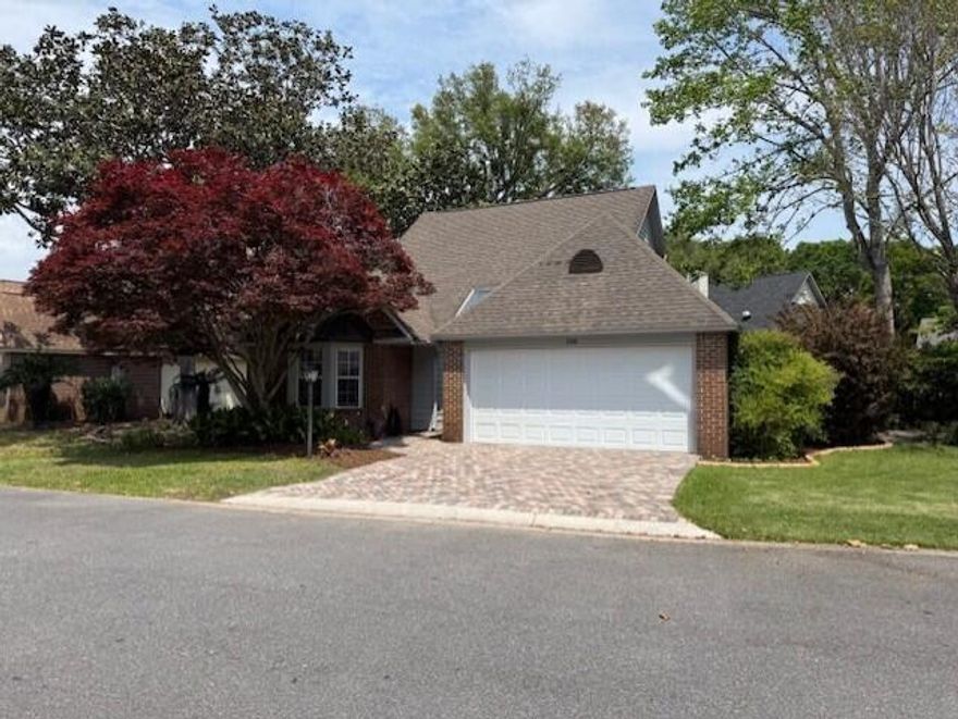 Great location in a great subdivision in the heart of Bluewater Bay. Well maintained home.  New flooring and paint. Vaulted ceilings, gas fireplace, Wonderful Florida room to just sit back, relax and enjoy the lush landscaping! Large paver patio to enjoy the outside air. Enjoy all the amenities Bluewater has to offer, Golf, pools, Tennis, marina/restaurant and Oyster Bar Transferable termite Bond with Terminix.