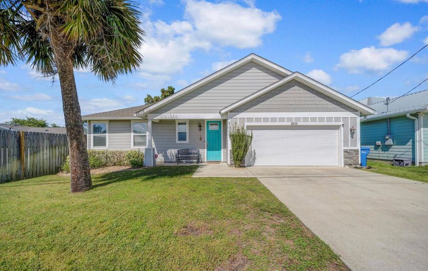 Turn Key and Renal Ready for the 2026 Rental Season! Walk to the beach from this coastal , newer construction 3-bedroom, 2.5-bath home with garage! This beautiful home has a great location and perfect for full-time living, a beach getaway, or a vacation rental! Thoughtfully designed with open concept and tile floors, quartz countertops, charming shiplap accent wall, and a covered porch overlooking the fenced backyard complete with a hot tub! NO HOA and short-term rentals are allowed! Just a short stroll to beach access at the end of the street and only 1/4 mile to the Grand Lagoon boat ramp. Conveniently located near St. Andrews State Park and just a quick drive to Pier Park. Don't miss your chance to make this your next home away from home!