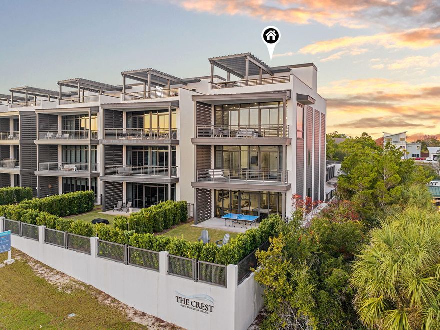 2174 W County Highway 30A is a modern coastal residence set within The Crest, one of the most discreet and architecturally intentional communities along Scenic Highway 30A. Built in 2020, the home spans approximately 3,500 square feet and presents a rare balance of contemporary design, privacy, and livability in a highly coveted coastal setting.

Defined by clean lines and expansive glass, the home is filled with natural light and framed by Gulf views. The interior layout is both thoughtful and flexible, offering five bedrooms, five full baths, and two half baths, along with multiple living areas designed to accommodate everyday living as well as entertaining with ease. An elevator services all levels, allowing the home to live comfortably for a wide range of buyers. A standout feature of the residence is the rooftop terrace, which captures panoramic Gulf views stretching from Destin toward Panama City. This elevated outdoor space enhances the coastal experience and serves as a natural extension of the home. At ground level, a private fenced yard and poolside cabana create a quiet retreat, while a two car carport, dedicated golf cart garage, and included golf cart add convenience and functionality.

Residents of The Crest enjoy access to a heated community pool and spa, offering a resort style amenity while maintaining a sense of privacy. Positioned directly on Scenic Highway 30A, the property is moments from the beach, dining, and the lifestyle that defines South Walton.

Equally compelling as a primary residence, second home, or luxury rental, 2174 W County Highway 30A offers a refined coastal opportunity anchored in strong design, thoughtful execution, and long term appeal.