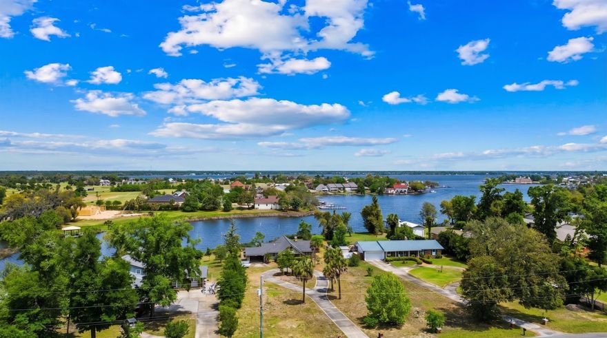 GULF ACCESS! Discover unlimited waterfront potential on this cleared, 0.81-acre lot in Lynn Haven featuring direct deep-water Gulf access. Priced at land value, this property offers an incredible head start for building your custom dream home or completing a rewarding renovation. The existing structure was professionally dried in with a new roof and is currently taken down to the studs, with the sale including fully engineered plans for a 2,268-square-foot, 3-bedroom, 2-bathroom home. Enjoy peaceful views across the bayou to the Panama City Country Club, plus the ability to install a custom dock for your boat. Located in a quiet cul-de-sac you have the ultimate freedom to park your RV, build to suit, and enjoy an unrestricted coastal lifestyle with no HOA. Offering unmatched possibilities just minutes from the Lynn Haven Boat Ramp, Tyndall AFB, and Panama City Beach, this is your ultimate blank canvas. Schedule your showing today!