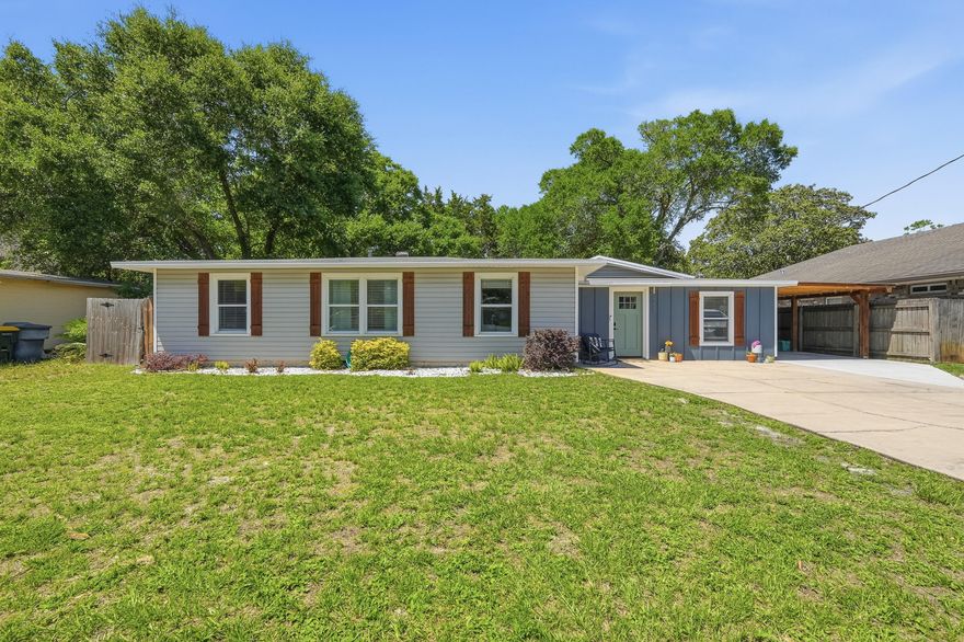 Nestled in the highly sought-after Elliott Point neighborhood, this charming 4 bedroom home blends timeless character with thoughtful modern updates, offering the perfect mix of comfort, style, and outdoor living! Thoughtfully renovated throughout, recent upgrades include a stunning kitchen island with quartz countertops, newly upgraded kitchen sink, added walk-in pantry, new exterior door leading to the backyard, expanded primary walk-in closet, renovated guest bathroom, custom electric fireplace with built-ins, mudroom with storage bench, and more.

Step outside and fall in love with the incredible backyard designed for year-round entertaining and relaxation. Enjoy the spacious pergola with outdoor TV and cover that can remain with the home, along with artificial turf, a large concrete pad, basketball hoop, and plenty of space to gather, play, or unwind.

Conveniently located just a short walk, golf cart ride, or drive to neighborhood waterfront access, Ferry Park, and all the shopping, dining, and entertainment of Downtown Fort Walton Beach, this move-in ready home truly has it all. Schedule your private showing today!