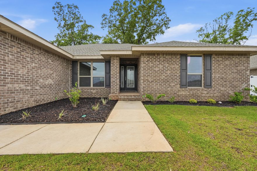 If you've been searching for the perfect blend of modern design and spacious living in Crestview--this is the one you've been waiting for!

This stunning all-brick, single-level ranch home is nestled in the desirable Silvercrest Estates and offers over 2,300 square feet of beautifully designed living space. From the moment you arrive the striking floor to ceiling glass front door sets the tone for the elegance and style found throughout this home.

Step inside to a thoughtfully designed split floor plan featuring an open-concept layout, soaring cathedral ceilings, and luxury vinyl plank flooring throughout. The expansive living, dining, and kitchen areas are ideal for both everyday living and entertaining. At the heart of the home is a show-stopping kitchen, farmhouse style all-white cabinetry, granite countertops, brand-new stainless steel appliances, and a spacious pantry. Complete with a large center island that has plenty of room for additional breakfast bar seating. A true kitchen dream! The living room is equally impressive, showcasing a modern electric fireplace with custom built-in shelving and a mounted TV space.

The primary suite is tucked away at the back of the house with a spacious walk in wardrobe, featuring an ensuite bathroom, soaking tub, glass shower and double vanity! On the opposite side of the home, you'll find three additional bedrooms, including a convenient Jack-and-Jill shared bathroom and an additional full guest bath - perfect for family or visitors.

Enjoy outdoor living with a large covered patio overlooking the backyard, ideal for gatherings or quiet evenings.
A dedicated laundry room with direct access to the spacious two-car garage adds everyday convenience.

This move-in-ready Crestview gem truly checks all the boxes--space, style, and functionality. Don't miss your opportunity to make it yours. Contact us today for a showing!