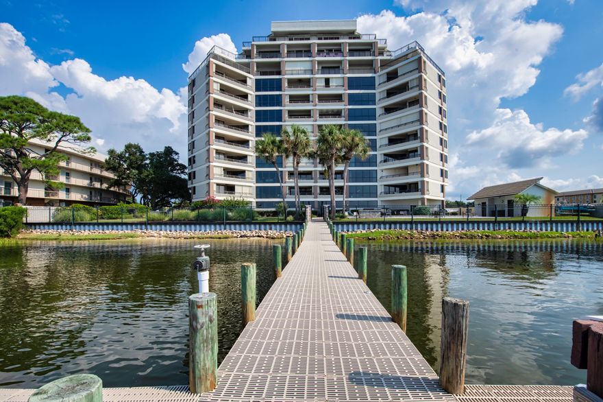Welcome to 200 West, where waterfront living meets effortless style. Perched on the 6th floor, this spacious 2BR/2BA condo offers panoramic views of the Santa Rosa Sound and unforgettable sunsets right from your private balcony. Here, life is about more than square footage -- it's about stepping downstairs to your deeded dock,, enjoying calm waters perfect for weekend cruises, and coming home to a community that values peace, security, and connection.

Inside, you'll find an open-concept living space with floor-to-ceiling glass that frames the water, a modern kitchen with stainless appliances, and a primary suite that makes every morning feel like a retreat. The building is pet-friendly (25 lb limit), secure, and designed for low-maintenance living -- perfect whether you're seeking a full-time residence or a lock-and-leave second home.

Skip the marina waitlists, skip the Gulf-front crowds, and discover why soundfront living is the Emerald Coast's best-kept secret. 200 West combines convenience, comfort, and a lifestyle you'll love.