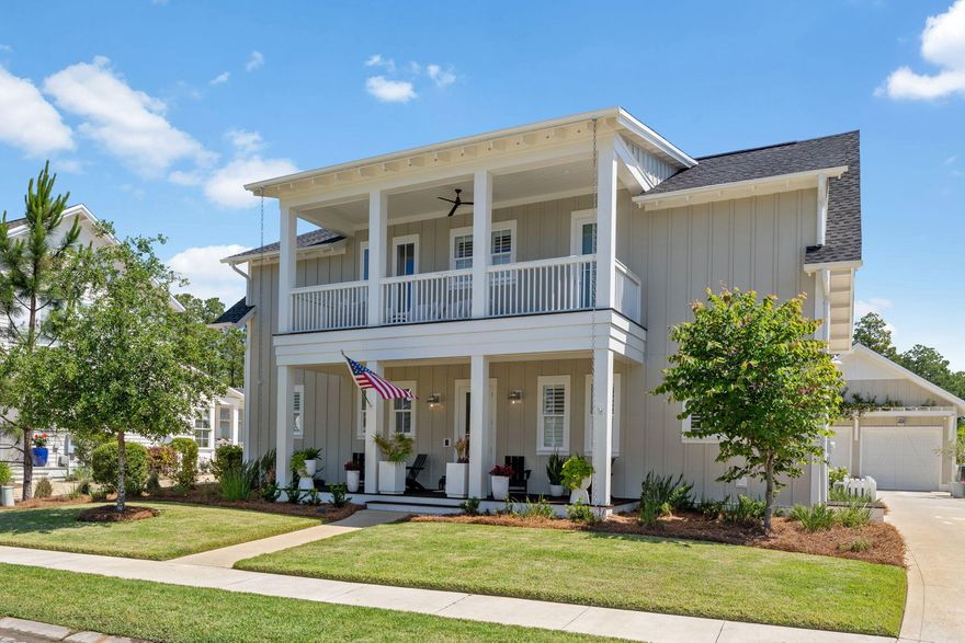 This home sits on one of the most desirable streets in Origins. Over 1,000 sq. ft. of covered outdoor living area that backs to a beautiful pond and pine trees for ultimate privacy. This home features 10 ft. ceilings, hardwood floors throughout, open floor plan, professional grade stainless steel appliances and much more. On the first floor you'll find the owner's suite overlooking the pool, a screened in patio, plus a gorgeous large pavilion with fireplace. Master bath is equipped with dual vanity, garden tub, a separate shower and an expansive custom closet. Three upstairs bedrooms all have their own on-suite bath. The home has a complete home automation system; equipped with speakers throughout, cameras, and temperature control. The two car garage also has heat and air.