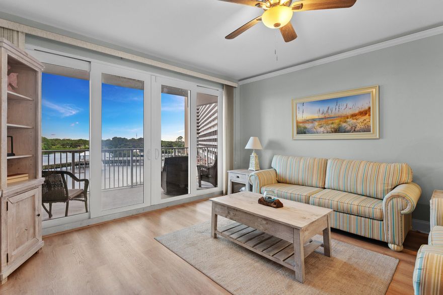 This beautifully updated, turnkey lakeview condo at Laketown Wharf offers an exceptional combination of value, style, and rental potential. Featuring 2 bedrooms, 2 bathrooms, plus a private bunk room, this thoughtfully designed condo offers approximately 1,262 square feet of comfortable coastal living and is ready to enjoy from day one, whether as a personal beach retreat, full-time residence, or vacation rental investment. 

The open-concept living and dining area flows seamlessly into the spacious kitchen, complete with granite countertops, a breakfast bar, tiled backsplash, and updated finishes that create an inviting space for entertaining or relaxing after a day at the beach. Recent improvements throughout the condo include a newer HVAC system (2023), water heater (2022), fresh interior paint, painted kitchen and bathroom cabinetry, updated lighting and LED fixtures, crown molding in the living room and bedrooms, and a barn door added to the bunk room for additional privacy and functionality. 

Step outside onto the oversized balcony and enjoy peaceful lake views along with Laketown Wharf's nightly fountain show, creating the perfect backdrop for morning coffee or evening relaxation.

Laketown Wharf is known for its extensive resort-style amenities, including five swimming pools, a putting green, fitness center, lakefront boardwalk, beach access, restaurants, and family-friendly attractions that continue to make it one of the area's most sought-after destinations for both owners and vacationers.

Whether you're searching for a move-in-ready coastal getaway, an investment property with strong rental appeal, or the perfect blend of both, this updated condo offers an outstanding opportunity in one of Panama City Beach's most amenity-rich communities.