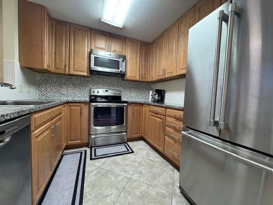 This fully furnished ground floor condo has  tile floor and upgraded cabinets throughout along with stainless steel kitchen appliances.  Pointe of View Condos are conveniently located just behind the very popular Shops at Grande Boulevard ... Publix, Craft Bar, Starbucks and AMC Movie Theater to name a few. It is only 3.8 miles from the white sandy beach of the emerald coast. Long term rental projections at $19K+. The Buyer is responsible to verify all pertinent information as needed.
