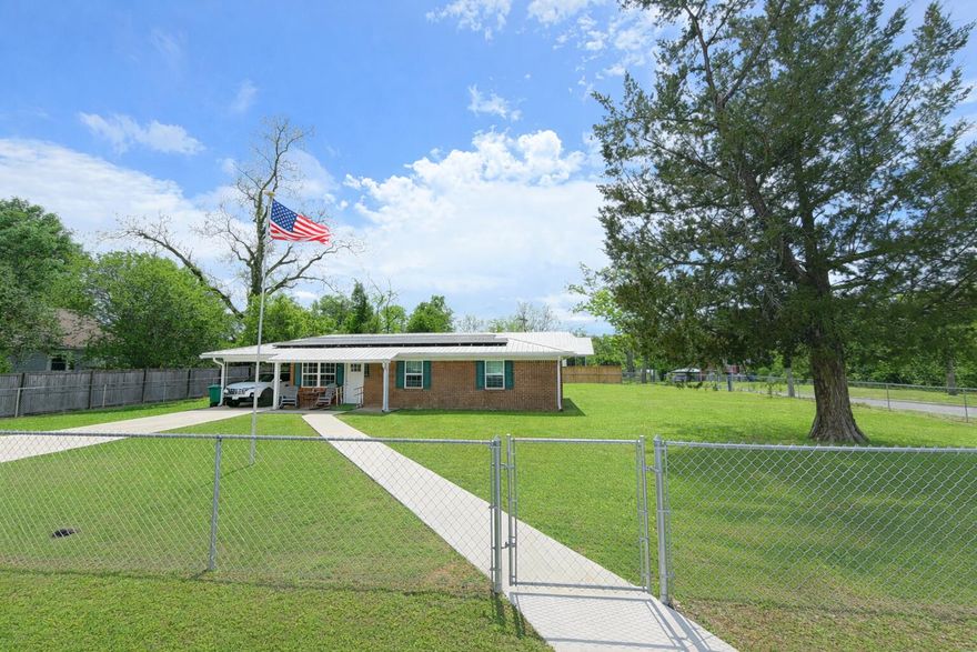 2.75% VA assumable loan available on this well maintained home, nice location to the heart of Marianna. Home was reported to have been completely renovated after hurricane Michael. Home is equipped with whole home backup generator, solar panels, water treatment system, and spa/hot tub. Home is thoughtfully placed on fully fenced corner lot with yard shed/shop that has power. Solar powered gate for ease of entry.