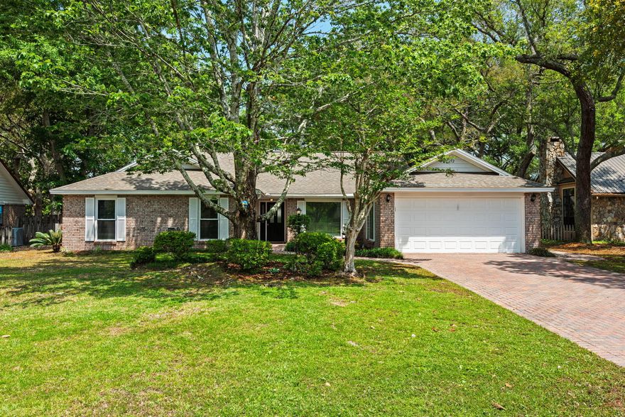 Darling on Dominica! Come see this Bluewater Bay gem - tucked away on a quiet circle, this beautifully updated pool home offers refined living in the heart of Bluewater Bay. With no HOA, this thoughtfully renovated all brick home boasts an open floor-plan and features 3 bedrooms + 2.5 bathrooms while a versatile flex space is included for a home office, playroom, or formal dining. The inviting vaulted ceiling family room is accented by a striking brick fireplace and serene views of the private backyard oasis. The spacious primary suite provides a relaxing escape with a spa-inspired ensuite bath showcasing a custom tiled walk-in shower & dual vanities. Designed with both style and comfort in mind, the home features plush carpeting in the bedrooms, luxury vinyl plank flooring throughout the main living spaces and bright tile finishes in the bathrooms. Situated on a generous 0.29-acre lot, the outdoor setting is framed by mature oak trees and lush landscaping, creating exceptional privacy and charm. Enjoy year-round entertaining with a natural gas heated pool, covered patio, expansive paver deck, fenced backyard, and two storage sheds for added convenience.
Extensive renovations completed in 2020 include a new roof and plumbing, along with beautifully updated kitchen and bathrooms, fresh interior paint, upgraded flooring, lighting, vanities, and ceiling fans. New windows were added in 2024. 
Residents of Bluewater Bay enjoy access to an array of community amenities including a marina, golf course, tennis courts, walking trails, and playgrounds -- all just minutes away. Contact your agent today for additional details or to schedule a private showing.