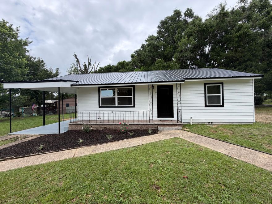 Fully Renovated on a large corner lot! Major updates include new HVAC, complete electrical rewire, all new plumbing, new water heater, new metal roof, and new windows. Inside features new LVP flooring, fresh updated lighting,  and a beautifully  remodeled kitchen and bath. Move-in ready with expensive items already taken care of.