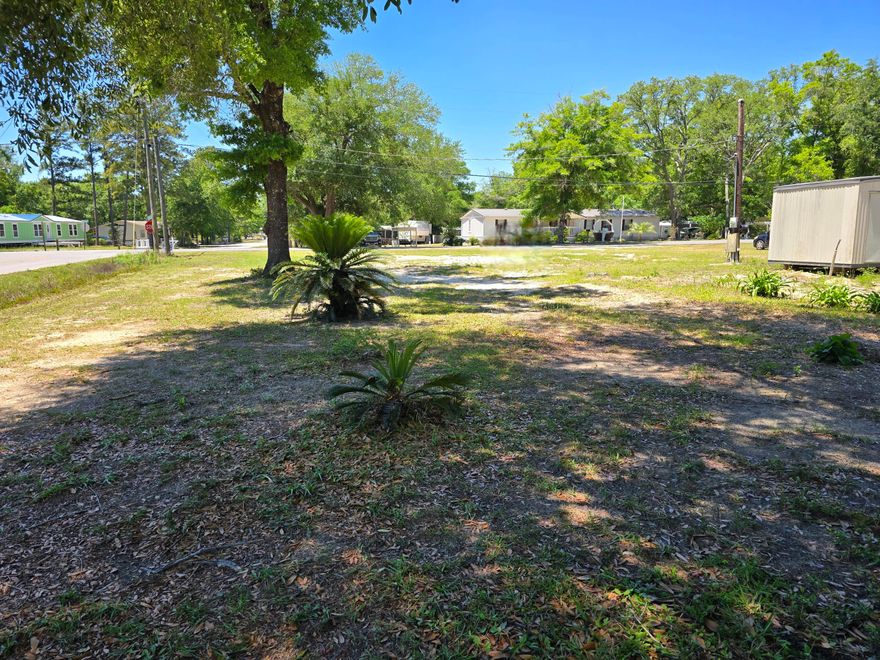 Prime opportunity in growing Freeport, FL! This flat, clear corner lot is ready for your new home or investment. Ideally located less than a mile from shopping and dining, and approx. ½ mile from US-331 & Hwy 20, offering easy access north and south. Enjoy the convenience of nearby amenities while being under 30 minutes from the white sandy beaches of the Gulf. Bring your builder, no clearing or delays!