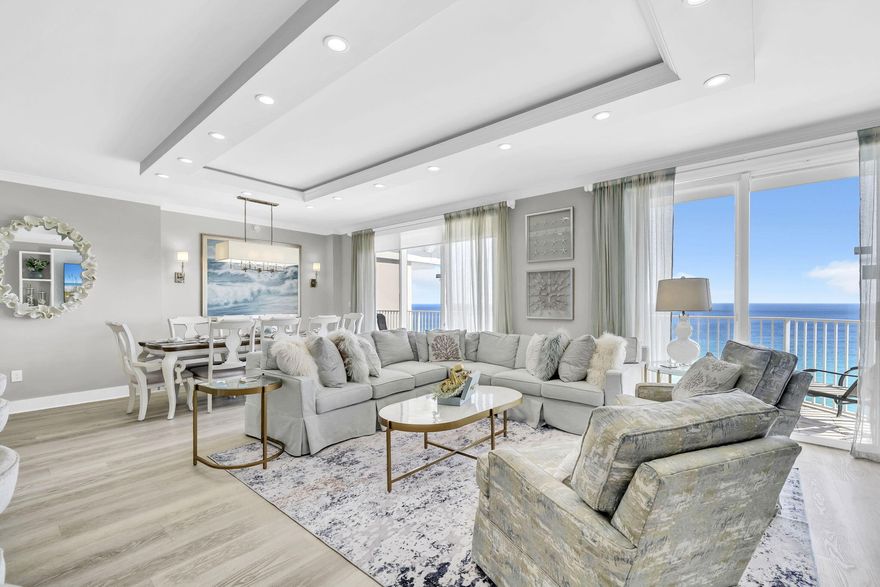 Experience coastal luxury at its finest in this stunning, fully renovated penthouse at Majestic Sun. Perched on the 12th floor, this exceptional residence boasts sweeping, unobstructed Gulf views that create a truly unforgettable backdrop.  Spanning 2,212 square feet, the thoughtfully designed layout features 3 spacious bedrooms and 3 beautifully updated bathrooms. This property was professionally designed and furnished, showcasing high-end finishes and impeccable attention to detail throughout.

The upgraded interior includes quartz countertops, new flooring and a completely remodeled kitchen outfitted with custom cabinetry, a large island, and premium LG appliances. Additional enhancements include a custom entertainment center, modern lighting fixtures, new HVAC system, electronic shades in the den, custom drapery in the primary suite, plantation shutters in guest rooms, fresh paint with updated trim and baseboards, and custom closet systems. The home is being offered fully furnished.

Perfect for hosting, the property also features four built-in bunk beds with stylish shiplap detailing--ideal for maximizing guest accommodations.  This unit includes a highly sought-after assigned parking space in the underground garage. Residents and guests enjoy access to resort-style amenities, including indoor and outdoor pools, two whirlpool spas, and a well-equipped fitness center.

Located within the gated Seascape Resort, you'll have access to 2,000 feet of pristine white sand beaches along with 300 acres of lakes, golf, tennis and pickleball. The nearby Town Centre offers dining, entertainment, and family-friendly attractions--all just steps away.

This is a rare opportunity to own a turnkey luxury penthouse with breathtaking views and exceptional upgrades--schedule your private showing today.