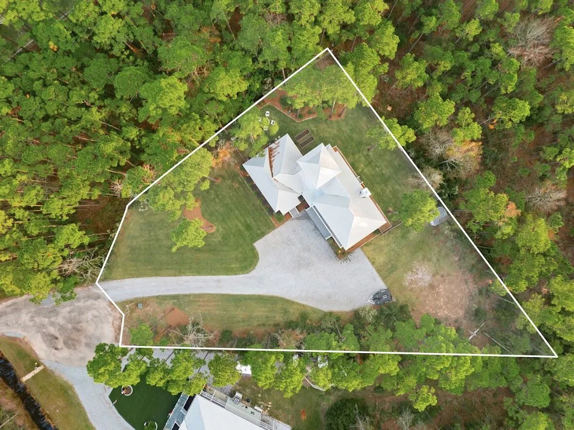 Tucked away on a quiet cul-de-sac, this beautiful coastal home offers – image 39
