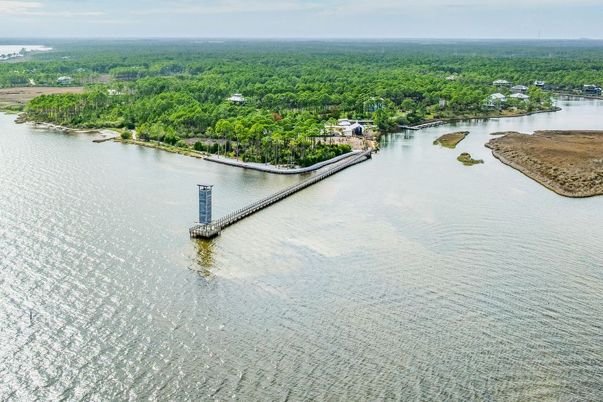 If you have never been out to the St. Joe community, Rivercamps on Crooked Creek, you will be mesmerized! Surrounded by 3 bodies of water, Crooked Creek, the Bay and the Intercoastal Waterway, this peaceful community is a nature enthusiast and boater's dream. 
Plenty of space and privacy and yet so close to all the conveniences one could want; only 15 minutes to the beach or Pier Park with over 100 stores, eateries and entertainment, 10 minutes to the airport and the planned new hospital and Publix also within 10 minutes. Build your dream home on this prime 1.29 acre waterfront end lot with beautiful Bay views. No other homes will be built in front, behind or on the east side. Rivercamps owners and guests enjoy world class amenities not found in any other community.