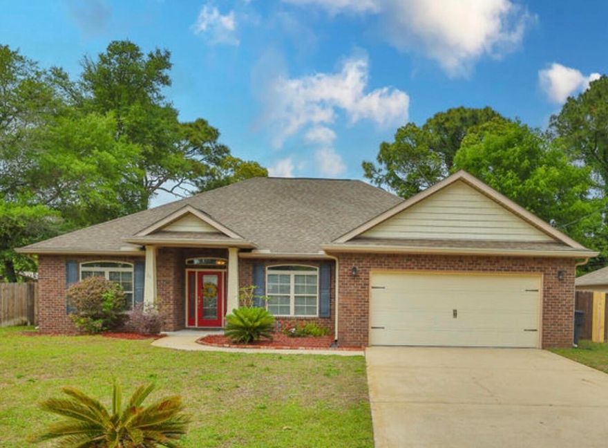 Welcome to a beautifully maintained all-brick home offering space, comfort, and an ideal central location just minutes to both AFB's, beaches, shopping, worships centers, & schools. Built in 2011 by a Parade of Homes-winning builder, this 4 bed, 2bath home offers over 2,000 square feet of well-designed living space w/a layout that flows ideal for both everyday living & entertaining, creating a seamless connection between living, dining, and kitchen spaces.
Inside you'll find a spacious living area w/crown molding, LVP flooring, & natural light throughout, creating a warm and inviting atmosphere. The kitchen features granite countertops, stainless appliances, a large pantry, & a raised breakfast bar perfect for gathering w/friends, breakfast w/the kids, or help with homework while you cook, all while staying connected to the main living areas. The split floor plan offers a private primary suite w/tray ceiling, garden tub, separate shower, double vanity, & a generous walk-in closet, providing a comfortable retreat at the end of the day, while the additional bedrooms offer flexibility for guests, office space, or hobbies.
Outside, enjoy a fully fenced backyard, w/luscious green grass, & space for a pool, offering plenty of room for outdoor activities and entertaining. The screened in patio is ideal for hosting friends, relaxing w/a good book & your morning coffee, or family dinners, extending your living space outdoors year-round. Situated on a generous lot with a sprinkler system, this home offers the perfect combination of quality construction, thoughtful updates, and everyday functionality, and this home has continued to be well cared for and is ready for its next owner, making it a strong option for those seeking comfort, space, and a convenient Fort Walton Beach location.
