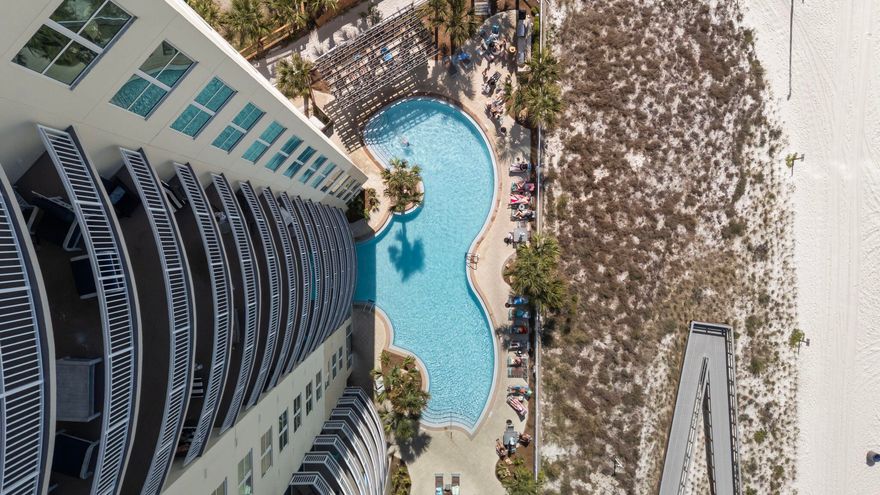 Welcome to Aqua Condo 1103 in Panama City Beach, Florida!! Two Large Beachfront Bedrooms with access to a comfortable, bow shaped balcony with extraordinary views make this one of the best floor plans anywhere on the beach! The open kitchen, dining, living space also features excellent views and balcony access while a 3rd bedroom with en-suite bath is also offered in this popular plan. These condos are true rental magnates and Aqua is one of the premier developments on Panama City Beach's west end just 1/4 mile to all of the activities at Pier Park. Aqua offers all of the amenities you need with two gulf front pools, hot tub, gulf front fitness center, covered parking, community room, tropical landscaping and more!