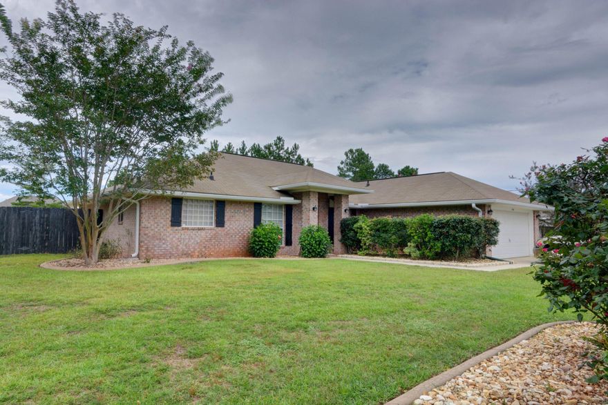 Cute as a button! This home is situated on a sprawling 1/2 acre fenced lot in the heart of Holley By The Sea. You are minutes to the bases and the beaches. The home features 3 large bedrooms, 2 baths and a separate office w/french doors (currently being used as a bedroom), a formal dinning room currently used as a sitting room. The kitchen has lots of countertop and cabinet space & stainless appliances. The master boasts 2 walk in closets & bath offering his/her vanities, separate tub/shower and a private water closet. Enjoy the outdoors in the spacious back yard w/large open patio and storage shed. Enjoy all the amenities of HBTS w/the 3 pools, tennis, gym, waterfront & much more! Call today to take a peak inside!