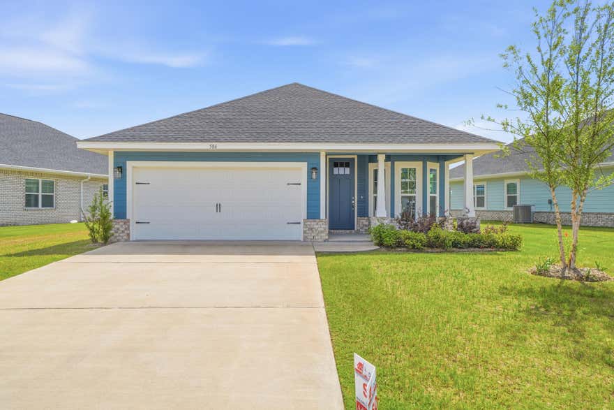 Nestled near the community pool and cabana, this new Craftsman-style home offers convenient access to the world-renowned 30A beaches, just a 20-minute drive away. With three bedrooms and two bathrooms, this home features cathedral ceilings, an 8-foot beautifully crafted front door, a spacious covered patio, quartz countertops in the kitchen and both bathrooms, and luxury LVP flooring throughout. The primary bathroom boasts a separate garden tub and shower, while upgraded Moen faucets, lever-handled hardware, and soft-close drawers add to the home's comfort and style. The property is complete with a sprinkler system. *Some photos may be of similar floor plans and may have been virtually staged to showcase the property's potential.*