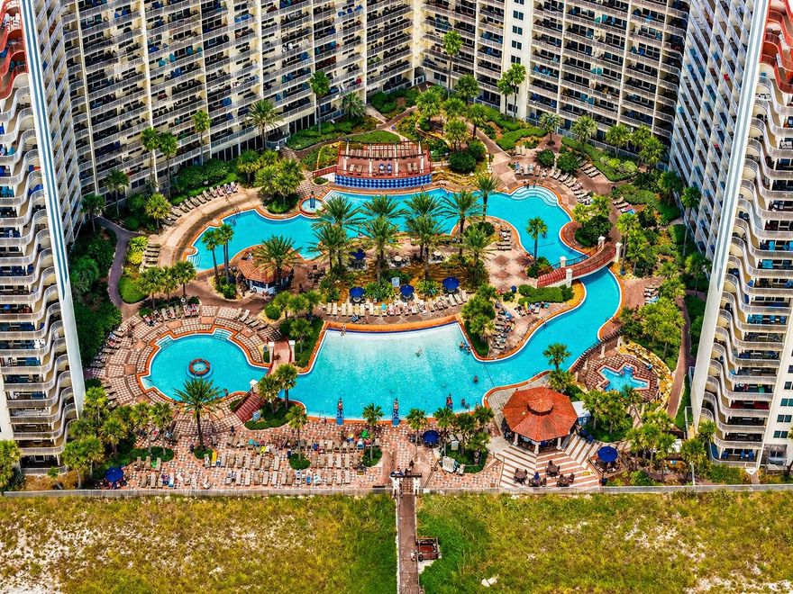 Penthouse living above Panama City Beach's most iconic resort pool, just steps from the Gulf!

Perched on the top floor of Shores of Panama, Unit 2311 offers a rare opportunity to own a private, elevated coastal retreat in one of the most recognizable beachfront communities along the Emerald Coast.

From the moment you step inside, the difference is immediate. With no neighbors above, the penthouse position brings a sense of quiet, privacy, and separation that's hard to find in condo living. Natural light fills the space, while the thoughtfully designed 2-bedroom, 2-bath layout creates a comfortable flow that feels both functional and inviting.

This is the kind of property that makes ownership easy. Whether you're escaping for long weekends, spending extended time at the beach, or simply looking for a place that doesn't require constant upkeep, this condo offers a low-maintenance lifestyle in a location that keeps everything within reach.

And outside your door, the experience only gets better.

Shores of Panama is known for its resort-style lagoon pool, tropical landscaping, and direct beachfront access, creating an environment that feels more like a vacation destination than a traditional condominium. From morning walks along the sugar-white sand to evenings spent enjoying the energy of Panama City Beach, everything you need is right here.

You're also perfectly positioned in the heart of it all, just moments from local dining, entertainment, and shopping, making it easy to enjoy the area without ever feeling removed from it.

For buyers watching the market, this is also an opportunity.

Properties that are well-located, easy to own, and ready to enjoy immediately are becoming increasingly desirable, especially as more buyers prioritize lifestyle, flexibility, and simplicity over heavy renovation or high-maintenance investments.

So, the question becomes:

Are you looking for a property to manage... or a place you'll actually use?

Because this one was clearly designed for the latter.

Schedule your private showing today!