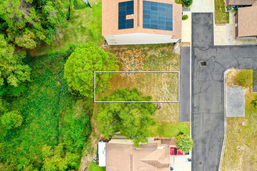 Welcome to an incredible opportunity in the charming Valparaiso, Florida! Seller may consider seller financing with a down payment. This stunning lot of land is a canvas for your dream home, complete with peek-a-boo views of the beautiful bay ! Imagine sipping your morning coffee while soaking in the serene vistas & gentle breezes.

Enjoy delightful glimpses of the bay, perfect for those picturesque sunsets and tranquil mornings.
Nestled in a charming community, you'll just a short drive to local parks,  & local shops.
Build Your Dream Home! 

Just minutes outside Eglin AFB's East Gate and quick access to both Hwy 20 & Hwy 85.

Hidden Cove is a waterfront community featuring a clubhouse, exercise room, pool, and dock boat slips available.
 Buyer to verify dimensions & anything deemed import.