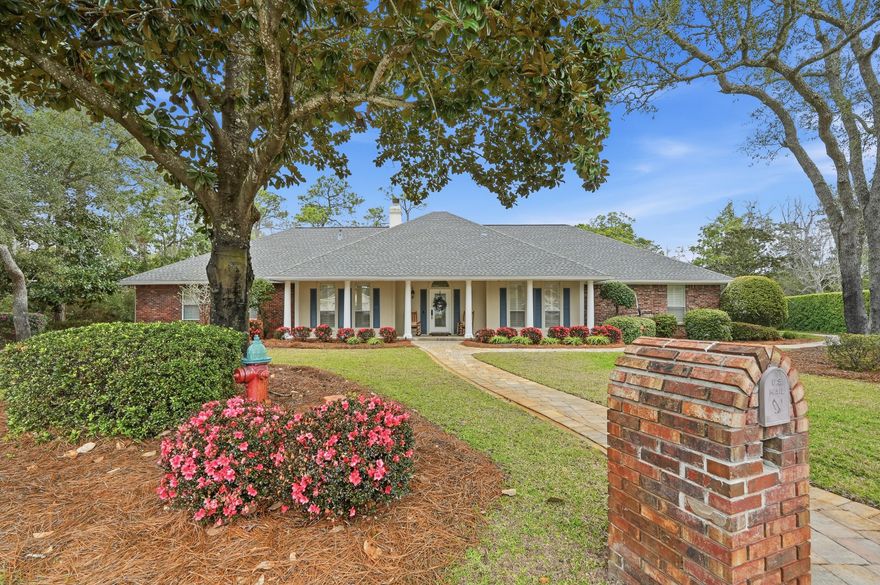 A truly exceptional one-story executive ranch, thoughtfully designed for those who appreciate quality, privacy, and the luxury of space. Nestled on a quiet cul-de-sac within the gated Southwind community, this waterfront property offers a rare opportunity to enjoy peaceful surroundings, expansive outdoor living, and the potential to further enhance your water views over time. With 4 bedrooms and 3.5 baths, this versatile layout is ideal for multi-generational living or hosting guests. The home features two private primary suites, each beautifully appointed with an ensuite bath, walk-in shower, garden tub, and spacious walk-in closets--creating comfortable, private retreats within a home built for connection.  From the moment you step inside, you're welcomed by vaulted ceilings and a stunning stone gas fireplace, creating a warm and inviting atmosphere. The open-concept design seamlessly connects the eat-in kitchen, formal dining area, and spacious Florida room--perfect for entertaining, holidays, and everyday living. A light-filled sunroom offers a peaceful escape for morning coffee or unwinding with a good book while taking in the natural surroundings.  Step outside to your large private outdoor oasis, where 100 feet of waterfront awaits. While the natural vegetation currently offers added privacy, selective clearing could easily open up beautiful water views. Enjoy the space to relax, entertain, and take in the peaceful surroundings of your serene, waterfront setting.  More than just a home, this is a place to gather, unwind, and create lasting memories. Schedule your private showing today.