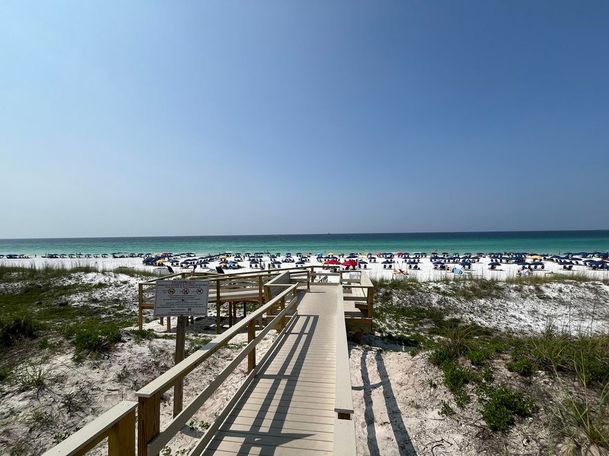 Escape to your own piece of paradise in the gated, beachside community of Maravilla. Unit 4102 is a beautifully updated 1-bedroom, 1.5-bath condo featuring a spacious bunk alcove, allowing the property to comfortably sleep up to six guests. Owners and guests enjoy access to exceptional amenities including 500 feet of private deeded beach access, a beachfront pool, seasonally heated secondary pool, clubhouse, fitness center, tennis and pickleball courts, and shuffleboard. This move-in-ready unit has been thoughtfully updated with a remodeled kitchen and bathrooms, updated HVAC, stylish furnishings, modern lighting, and fresh neutral paint throughout. The current owners have primarily enjoyed the condo as a personal vacation retreat for family and friends, and their pride of ownership is evident in the condition of the property. Maravilla has long been considered one of the best value opportunities along Scenic Gulf Drive for buyers seeking strong short-term rental potential combined with private beach access. Based on current market performance, this unit has a projected annual rental income in the $30,000-$35,000 range, making it an attractive option for buyers looking to offset ownership costs while still enjoying personal use. Whether you're looking for a second home, an income-producing investment, or a combination of both, Unit 4102 offers a compelling opportunity in one of Miramar Beach's most popular beachside communities. 

***Virtually enhanced photo included to demonstrate how a simple flooring upgrade could further increase rental appeal and value.***