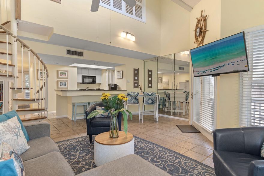 A must see!!! Beautiful coastal cottage in the highly sought after Hidden Dunes Beach & Tennis Resort. Tastefully furnished and one of the most popular rental units in the resort, an investor's dream. Beach Cottage 213 is perfectly situated overlooking the pool grounds and lush landscaping. Tile flooring throughout the entire condo and granite kitchen counters, truly a turn key unit! Second floor bedroom has been closed off for added privacy. Access to the community's professional tennis & pickleball center with on-site pro, professionally staffed tennis center hosting seasonal activities, guard gated with 24-hour security, natural gas grills, complimentary seasonal tram service and a clubhouse.