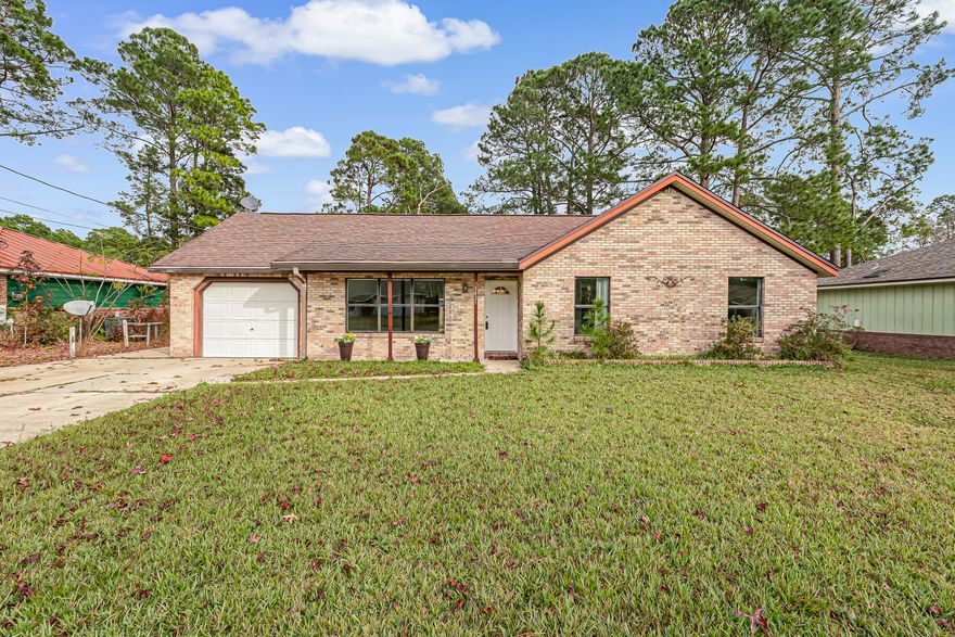 Welcome back to this charming home now newly listed after thoughtful upgrades that elevate both comfort and appeal. Step inside to immediately appreciate the difference.  Newly installed glass in all windows and slider fill the home with natural light. Fresh interior painting and some light fixtures give the space a modern airy feeling. Open concept living and dinning areas flow seamlessly into the bright kitchen perfect for entertaining.  Large fenced area in back of home being all concrete, make lawn maintenance a breeze.  Plenty of room for RV or trailer parking, or pickleball court, cornhole competitions and many more.  Close to shopping, restaurants, hospital and parks, Pristine white sand beaches within a few minutes drive. Come and see for yourself.