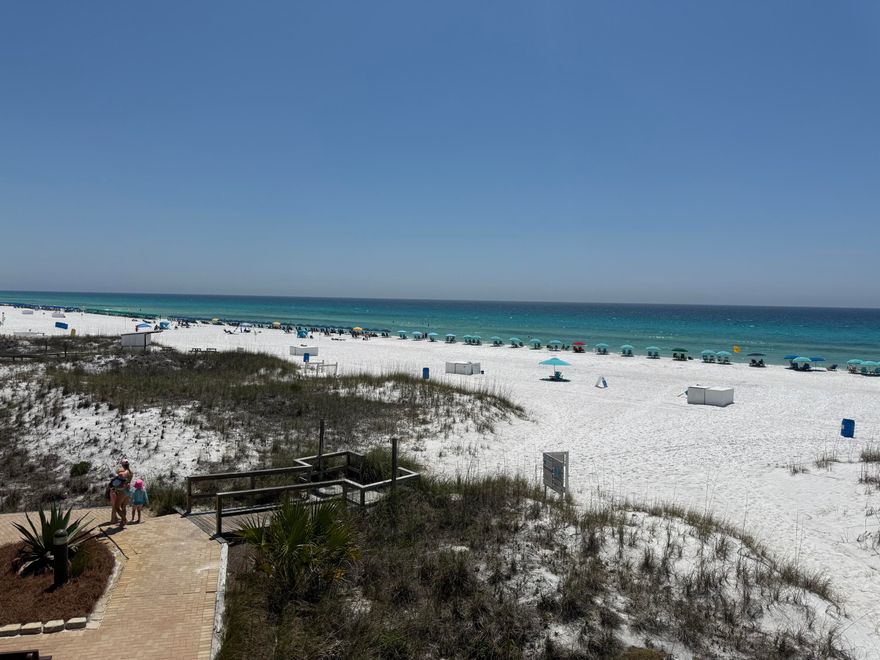 This ground floor unit allows straight to the incredible white sand beaches of the Gulf without crossing a road. This one bedroom unit has many updates.  Hallway wall removed to create a large bedroom, washer/dryer installed which guests love, spa quality bathroom, updated kitchen, tile floors, newer sliding door, beautiful plantation shutters, and quality furniture! Super popular first floor condo!  No steps and a easy 75 yard walk to beach.  Condo comes with a beach storage locker and is right next to the community pool and BBQ grills.  Resort is GATED and offers a Game Room, Tennis, Basketball, Pickleball, Fitness Center and Shuffleboard.  Silver Dunes has one of the best (if not the best) planned social calendars for Guests: this is where family memories are made!