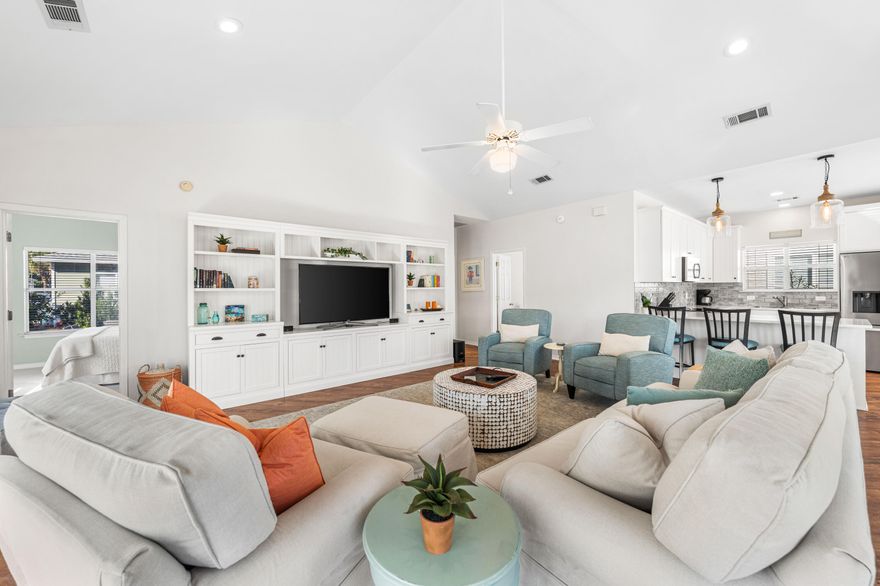 Dreaming of a charming beach cottage steps from the sugar white sands and emerald waters of the Gulf, white picket fences welcoming you home and a community of pastel  homes painted the color of summer where there are more full time neighbors than rentals? You found it at 4472 Clipper Cove, a 3 bedroom, 2 bath single story coastal cutie that is not too big and not too little - it's just right. This fully furnished, turnkey ready pristine charmer has never been rented and features two updated bathrooms, beautifully updated kitchen with custom cabinetry, a Murphy bed, and even a convenient exterior storage room for beach gear. A covered front porch complete with porch swing as well as an open patio out back is the perfect place to grill the catch of the day and an outdoor shower makes rinsing those sandy toes off easy. Soaring cathedral ceilings make the living areas feel open and airy and a soothing coastal color palette of serene blue greens alongside crisp white walls bring the beach home. Hop on your golf cart to explore the beaches of Scenic Gulf Drive or enjoy the shopping, dining, and entertainment of the Destin Commons area. Come see how coastal charm and large living come together in 1290 square feet at the beach.