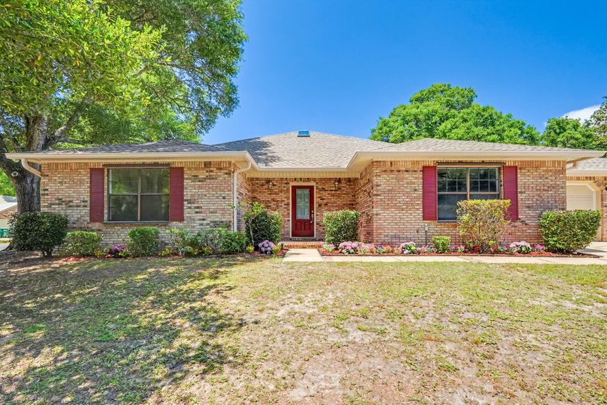 Welcome to Niceville and your new home! This spacious all-brick home offers flexible living spaces, thoughtful updates, and NO HOA fees. Situated on a desirable corner lot, this home provides room to live, work, entertain, and relax. The welcoming foyer opens to a versatile living/dining space featuring high ceilings, crown molding, and skylights. A large flex room is perfect for a home office, gym, playroom, media room, or additional living space. The kitchen features painted wood cabinetry, Italian marble countertops with matching backsplash, breakfast bar seating, stainless steel range and microwave, plus a brand-new refrigerator. The open kitchen and great room include built-in cabinetry and flow into a Florida room overlooking the fully fenced backyard and patio. The spacious primary suite offers double vanities, jetted tub, separate shower, and walk-in closet. Two additional bedrooms share a full bath. Storage is abundant with generous closets, backyard shed, and a climate-controlled storage room with exterior access (not included in square footage). 
Recent updates include new roof (2025), transferable roof and gutter warranties, new gutters (2026), water heater (2023), fresh interior paint (2026), fence updates (2026), sprinkler system on well water for lower irrigation costs, and brand-new carpet in bedrooms and office. Travertine and tile throughout main living areas. Move-in ready near schools, shopping, military bases, and Emerald Coast beaches.