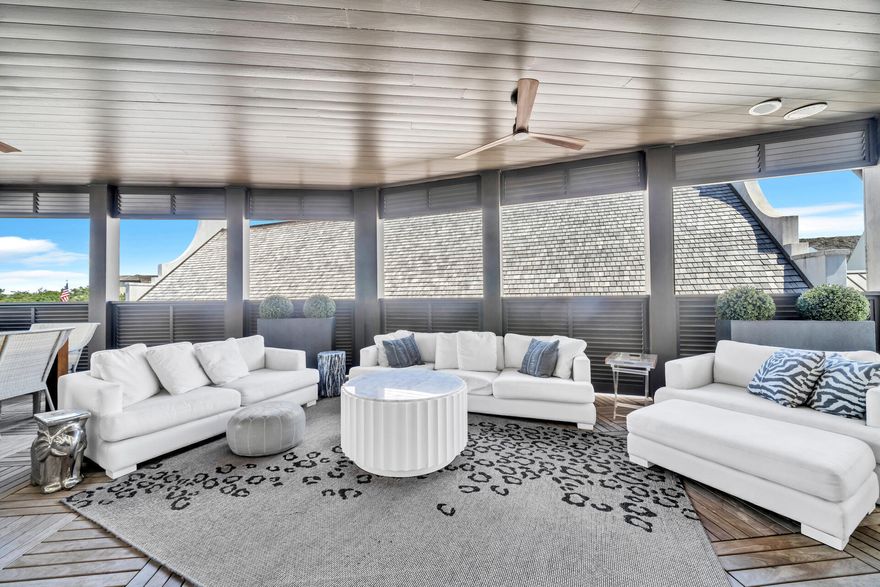 Ideally positioned just south of 30A, this beautifully appointed residence is located in the heart of Rosemary Beach within the distinguished Orleans condo building. From the moment you arrive, the setting offers easy access to the Town Center's shops, dining, and the coastline beyond.

Inside, natural light fills an open kitchen, dining area, and living area, designed for both comfort and style. A generous 468-square-foot balcony extends the living space outdoors, offering multiple seating areas with views across the Town Center and glimpses toward the Gulf.

The floor plan includes two spacious bedrooms, each with an en suite bath and private balcony. A thoughtfully designed hall alcove features custom bunk beds behind a sliding barn door, with convenient access to a third full bathroom. A private one-car garage conveys with the property.

Interior finishes reflect a refined coastal aesthetic with modern influence, featuring high ceilings, expansive windows, and a cohesive blend of classic detailing and contemporary design. The kitchen is anchored by a large Caesarstone island with seating, complemented by premium appliances and custom cabinetry. The living area is highlighted by an illuminated onyx feature wall, adding warmth and ambiance.

The primary suite offers a well-appointed bath with separate tub and shower, along with a walk-in closet. Throughout the residence, materials and fixtures have been carefully selected for quality and longevity.

Interior features include:

Wolf range, hood, and microwave
Sub-Zero refrigerator
Asko dishwasher
Custom cabinetry with Emtek hardware
Caesarstone countertops throughout
High-performance hardwood flooring
Imported limestone, ceramic tile, and marble accents
Waterworks fixtures and hardware
Dornbracht kitchen faucet
Kohler sinks and tubs
Toto toilets

Offered fully furnished with curated pieces by Mitchell Gold + Bob Williams and commissioned artwork, this residence presents a turnkey opportunity in one of Rosemary Beach's most desirable south-side locations. Buyer to verify all dimensions.