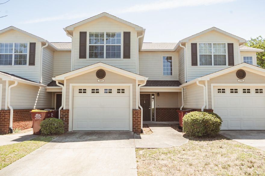 Available now.........Walk out your back door and this unit BACKS TO THE COMMUNITY POOL!  South Crestview with easy commute to bases, beaches and shopping.  Eagles Landing features this 3-bedroom, 2.5 bathroom with a single car garage, under stairs storage. All bedrooms are upstairs with a spacious master bedroom and bathroom with walk-in closet.  The two spare bedrooms have a walk-in closet as well. Downstairs you will find the living room boasts a wood looking ceramic tile, storage, 1.2 bath and laundry room.  Galley style kitchen, 1 car garage and open back patio.  This townhome community has a pool, playground, and covered front porches.  Lawn care is provided by the HOA for the complex.  Pets allowed with approval.  No smoking and no vaping.