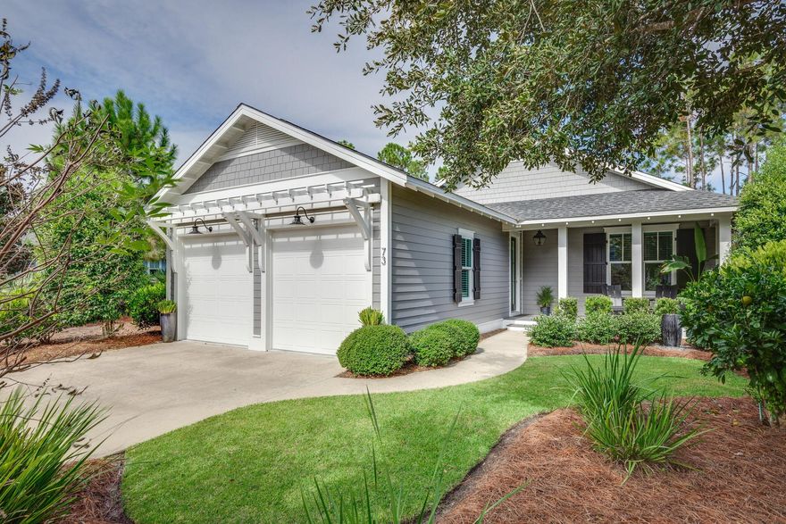 Immaculate single-level 3-bedroom, 3-bath home built by Huff Homes in the sought-after Winter Garden phase of Watersound Origins. This move-in-ready residence sits on a premium lot featuring a side buffer, white picket fenced yard, and beautiful views of landscaped park and natural green space that backs directly to walking trails. Enjoy easy walkability to the Village Commons fitness center and resort-style pool. The open-concept floor plan seamlessly connects the living, dining, and kitchen areas, complete with stainless steel appliances, gas cooktop, large island with breakfast bar, and custom bar nook. Wood-look vinyl plank flooring runs throughout most of the home. The primary suite includes a soaking tub, seamless glass-and-tile shower, double vanity, and custom walk-in closet. Two additional bedrooms and two full baths complete the single-level layout. Outside, a screened porch opens to a paved patio for effortless outdoor living. This rental-restricted community offers golf, tennis, pickleball, gym, pool, playground, and kayaking on Lake Powell with access to 30A beaches near Camp Helen State Park. Just minutes from Scenic Highway 30A's white-sand beaches, dining, and shops. Perfect as a primary residence or second home, this Huff Homes gem delivers exceptional lifestyle, location, and value in a desirable single-level 3 bed, 3 bath floor plan.