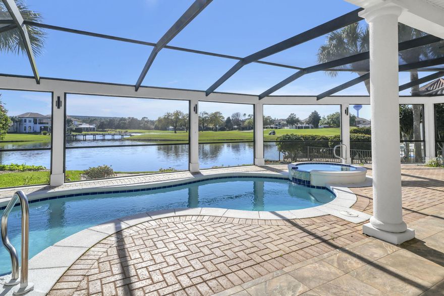 It's all about the VIEW! 503 Regatta Bay blvd is located lake front across from the 16th tee (no golf balls hit your home) in the prestigious Regatta Bay Lakes neighborhood.  This custom built home is excellent for entertaining with 20' ceilings, wide open spaces, a grand staircase, disappearing sliding glass doors that open on to the screened in pool lanai with non slip tile, hot tub, built in outdoor kitchen and plenty of room for seating that allows for al fresco dining while you watch the sunset nightly and fireworks 3 times a year bug free.  The pool bathroom helps keep water contained outside and comes with a shower to wash off the sand from the beach only 1.5 miles away.  There are door alarms for peace of mind with little ones too.  
The gourmet kitchen has custom dovetailed Schrock cabinets, built in SubZero fridge, 6 burner Dacor gas range, built in Thermador oven and microwave, a Miele dishwasher, and a wine/drink fridge. New emerald pearl quartzite countertops, a deep Blanco granite sink with a hot water dispenser and a water filter system along with a custom center island with a wood Boos block top complete the space.

This multigenerational home offers 2 large primary suites on the main level on opposite sides for privacy. The main master wing has 2 large walk-in closets with built in organizers and the other is ADA equipped and also has a large walk-in closet. Both suites have sliding glass doors that open on to the screened in lanai and oversized bathrooms with *Schrock custom cabinets and tons of storage. The large bright laundry room off the main primary wing has a huge picture window that adds lots of natural light, has more storage and is also accessible from the hallway off the 2 ½ car garage.

A dedicated office off of the sitting room has lots of storage with 2 custom built in desks and custom cabinets and shelving.

There are 2 additional bedrooms upstairs with new light white oak hardwood floors. Bedroom #3 has an attached fully remodeled bathroom and the versatile bedroom #4 has a kitchenette with new quartz countertops, seating and storage, a small sink, 2 mini fridges, and a small dishwasher. A spacious bedroom, guest suite, or media room as owners currently use the space, great for watching the game with friends and family. The bunkroom can be a massive walk-in closet or an ensuite bathroom depending on the next family's needs.

The upstairs spacious screened in covered lanai has amazing views of the golf course, lakes, and skyline and is perfect for reading a book or relaxing.

Too many updates to list (full list is attached to MLS) to include 2 new HVAC units, new hot water heater, new pool pump, new quartz in laundry room, new granite installed in outdoor kitchen with custom tile backsplash wall for easy clean up, interior recently painted, new ceiling fans, 8 new screen panels replaced after SNOW!

Tile floors downstairs are easy to keep clean (sand) and newer carpet is on stairs and landing only.

Owners also have a 4 point inspection report and wind mitigation report dated 10/2024 for low home insurance available. There is a Generac whole home generator, 2 termite bonds grandfathered in to the property and a charger for an electric car out front on the side of the home.

Regatta Bay is a private gated community within walking distance to shopping, dining, Whole Foods, Destin Middle School, Lulu's, Legendary Marina and the beautiful Destin beaches. A perfect oasis, rated a top GOLF course by Golf Digest magazine, rated the safest community in Destin. Come experience the Regatta Bay lifestyle and make 503 Regatta Bay your home today. Video is available on Youtube, look up by address.