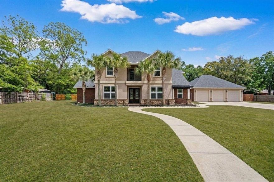 This impressive two-story home showcases timeless curb appeal with a striking
combination of rich red brick, modern stucco, and natural stone accents. A grand double-door entry welcomes you into a beautifully appointed living room featuring elegant herringbone tile flooring, with white crown molding, recessed lighting, and French doors that open to a private, fully fenced backyard--perfect for outdoor entertaining and summer gatherings.
The spacious eat-in kitchen is designed to impress, offering detailed cabinetry,
wraparound granite countertops, a center island, and direct access to an inviting pergola--ideal for indoor-outdoor living. The main-level primary suite is a true retreat, complete with vaulted ceilings, dual ceiling fans, a walk-in closet, and a luxurious en-suite bath featuring granite countertops, a large tiled shower with dual shower heads, and a relaxing soaking tub. Upstairs, a grand staircase leads to five additional generously sized bedrooms and three full bathrooms, providing ample space for family, guests, or flexible living needs.
Additional highlights include:
Attached 2-car garage with new doors and keypad entry
Oversized detached 2-car garage for extra storage or workshop space
Tankless water heater
Two new HVAC systems (installed March 2026)
Security system with motion detectors on all windows and doors (serviced by
Panhandle Security)
Ideally situated outside city limits while remaining convenient to the interstate, shopping, dining, and everyday amenities, this exceptional home offers the perfect blend of space, style, and functionality.