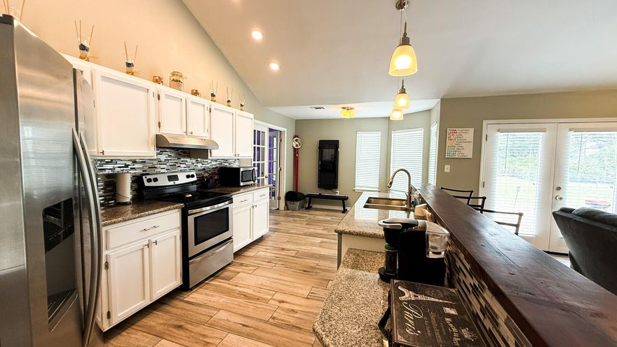 Coastal living is calling! Located in the desirable Sound Retreat community, this beautifully updated Navarre home offers private neighborhood access to the Santa Rosa Sound where you can enjoy kayaking, paddle boarding, fishing, boating and soaking up the sun. 
Imagine starting your mornings with peaceful walks as the sunrises to ending your evenings watching breathtaking sunsets just minutes away. 
For added peace of mind, major systems have been recently updated, including a roof (2024), HVAC system (2023) and water heater (2022).
The property is located in a NO FLOOD ZONE and has NO HOA DUES. 
An annual termite and pest control plan is also in place. 
The septic system is located in the front yard, (right side) leaving ample space in the backyard for a pool, outdoor entertaining area or future backyard plans. 

Utility costs are favorable with water/sewer averaging around $20/month for a family of four and electric on average $200/month.
Inside, you'll find beautiful updates throughout the home, creating a welcoming space that blends comfort with coastal charm. Whether you're looking for your first home, a place to downsize or a home that supports an active coastal lifestyle, this home offers the opportunity to enjoy the best of Navarre living. Where days on the water and peaceful evenings by the Sound can become part of your everyday routine. 
Ideally located just off Highway 98, this lovely home offers quick access to shopping, dining, top-rated schools, grocery stores, gyms, post office and medical facilities. 
Nearby attractions such as the Gulf Breeze Zoo, Navarre Beach and the stunning Emerald Coast are all just a short drive away.

Updates made in 2017 include:
Tile flooring throughout, walk-in shower and glass inserts in primary bath, flood lighting, pendant light in the kitchen and granite counter tops in kitchen.

Sprinkler system needs a new pump & sprinkler head. Seller will replace with an acceptable offer.

Schedule your showing today to experience the Sound Retreat lifestyle in the heart of Navarre.