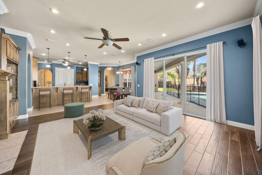 Step into one of the largest homes in highly desirable Palm Bay community that is positioned perfectly on a cul-de-sac in this single-level home with a private pool, 4 bedrooms, 3 full baths, home office, multiple living areas and an extended garage! This home has been well-maintained and offers over 2,800 square feet and is just 10 minutes from the World's Most Beautiful Beaches. 

As you step inside, you're greeted with 14 foot ceilings and a home office with glass French doors. A formal living room and dining room also feature soaring ceilings with incredible views of the private pool and covered patio. The family room, kitchen and breakfast dining area are just off the living room and are accessible to the pool and patio. The kitchen features solid wood cabinetry, center island and a large pantry. Ample counter space and a breakfast bar is great for entertaining and is open to the breakfast nook and family room. The family room features tons of natural light and built-ins with a fireplace. The three guest bedrooms and two guest baths are easily accessible from the family room while the split floor plan is highly desirable where the primary suite is located off the formal living room. 

The primary suite offers a tray ceiling, French doors to the patio, lots of natural light, dual walk-in closets, soaking tub, walk-in shower and dual vanities with solid wood cabinetry. The high ceilings in this single-level home are incredible! 

The quality construction paired with a 2-car garage is great at the beach and even better...an extended garage with roll-up garage door for golf cart, ice machine, toys and more!! In Palm Bay, you're just minutes from dining, shopping and entertaining on Panama City Beach. The Florida lifestyle is perfected with a private pool on a cul-de-sac homesite giving a spacious yard and privacy. Make Palm Bay your home today!