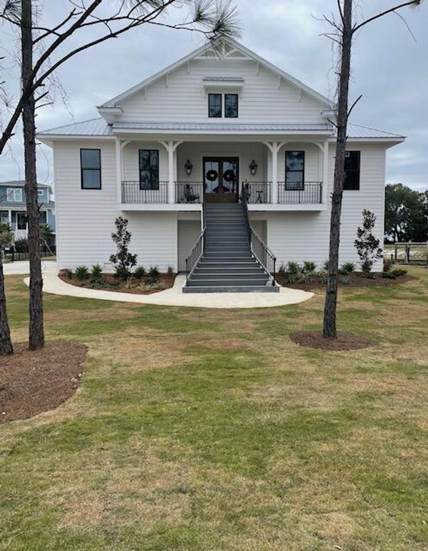 Canal lot! Incredible views of the Santa Rosa Sound.

Single family home, waterfront on pilings, elevator to main floor, double lot with 160' dock and boathouse with lift.

2 lots-
34-2S-28-5180-00000--1150
&
34-2S-28-5180-00000-1160 Natural Gas to:
Forced air furnace
Cooking
Porch lanterns
Tankless HW heater with circulating pump
Fireplace
Grille

High School is Navarre & Soundside (brand new, 3 miles from listing), opening for 2026/27 school year.