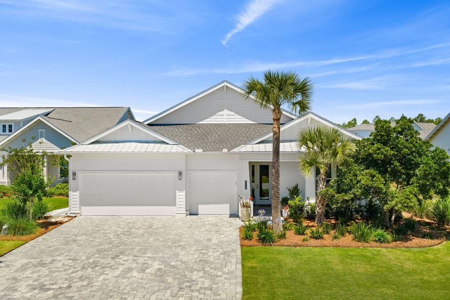 Welcome to 40 Tamoka Court, in the highly sought-after gated, NatureWalk at Watersound Origins. A beautifully designed coastal retreat, This Panama floor-plan offers luxury finishes from top to bottom, effortless indoor-outdoor living, and resort-style amenities just minutes from the beaches of 30A.
This thoughtfully crafted home features an open-concept, one level, floor plan filled with natural light, crown molding, and upscale finishes throughout. The gourmet kitchen is a showpiece with custom cabinetry all the way to the ceiling, quartz countertops, stainless steel appliances, a gas cooktop, oversized island seating, and abundant storage, all flowing seamlessly into the spacious living and dining areas designed for entertaining and everyday living.
The inviting living room centers around a stunning gas fireplace with custom built-ins, a cypress mantle, & shiplap. Leading to an open & expansive covered lanai, with an outdoor kitchen, remote screens and beautiful views. Enjoy your own resort-style pool and spa, multiple lounging and dining areas, and a beautifully maintained lawn complete with a putting green, creating the perfect setting for relaxing or entertaining year-round. Enjoy beautiful sunsets across the pond from your backyard oasis. 
The primary suite offers an elevated design with trim details, beautiful wallpaper ceiling, designer finishes, automatic shades and tranquil backyard views.  Built-in, custom shelving in the closet, a large walk-in shower & soaking tub in the primary bath. 
Don't miss the oversized 3-door garage with epoxy floors, workstation and plenty of storage. 
Situated on a quiet cul-de-sac in one of the area's most desirable communities, residents of NatureWalk at Watersound Origins enjoy access to miles of trails, community pools, fitness facilities, parks, and golf, all while being conveniently located near shopping, dining, and the white sand beaches of the Emerald Coast.
Whether you're searching for a full-time residence, second home, or investment opportunity, 40 Tamoka Court delivers the perfect blend of luxury, lifestyle, and coastal charm.