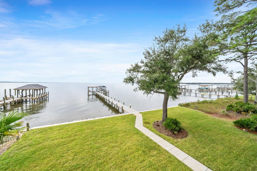 Accepting Back Up Offers! Age in place gracefully in this minimalist inspired, comfortably accessible, multi-generational luxury home! 3 PRIMARY SUITES and an ELEVATOR make this custom, Choctawhatchee Bay Front home a top choice. This 2021 build is nestled on a quiet cul de sac, in Bay Harbour, Walton County, Freeport, Florida. Thoughtful design meets modern comfort in this amenity filled home! Waterfront living & innovative features are yours! Refresh & reset! This home offers comfort, convenience, low-maintenance, nature inspired landscaping & inviting outdoor spaces. Fish from your private dock or simply relax by your outdoor firepit! Breathe easy with custom hardwood flooring throughout & NO CARPET. Want to know more? Schedule your private tour today!