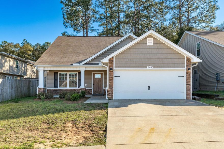 Want to own a like new home with a 3% Va assumable loan? Here is your opportunity! Located just 14 miles from Duke Field, this stunning Craftsman-style home features a spacious open floor plan designed for modern living. The bright and airy eat-in kitchen showcases elegant white cabinetry, warm Toasted Chestnut laminate flooring, a breakfast bar, and a seamless flow into the dining and family rooms--perfect for gatherings. The first-floor master suite is a private retreat, complete with a walk-in closet, dual vanities, a relaxing garden tub, and a separate shower. A convenient half bath and indoor laundry room are also located downstairs. Upstairs, you'll find a versatile media room and three generously sized bedrooms, each with ample closet space.