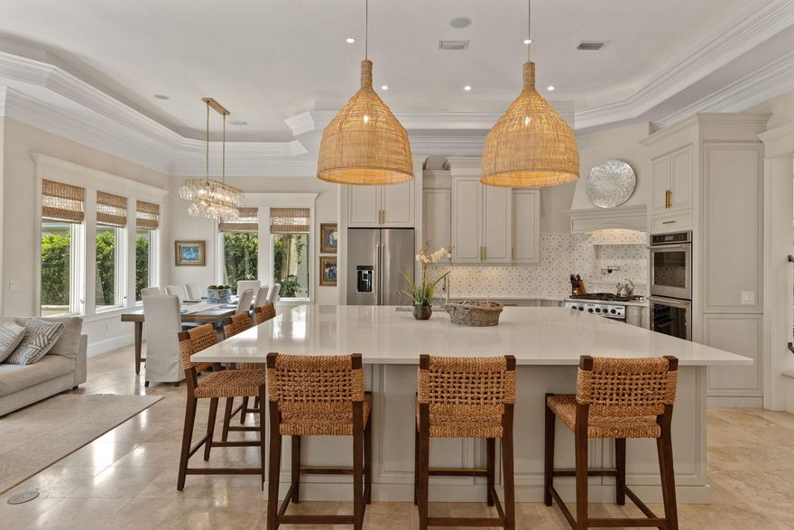 NEW PRICE!!!Located on one of The Most Desirable Streets in the Gated Community of Burnt Pine, situated within the Exclusive Sandestin Golf and Beach Resort is this Custom 4 Bedroom 6 Bath home overlooking the 16th Green.
This Timeless Designed Home Sits on a .5 acre lot boasting expansive Golf and Water Views. This picturesque setting is  surrounded by mature trees & lush manicured landscaping. The Classic Interior features  an Open Floor Plan with 12 foot ceilings on the First Floor ,with natural stone & hardwood flooring. Gourmet Kitchen with custom cabinetry, large island, dining room and keeping room. First Floor also features a Large Private Primary Suite with 2 Large Walk In Closets and Office all Overlooking the Lake and Golf Course. Pool, Summer Kitchen & 3 Car Garage. Upstairs has 3 bedrooms