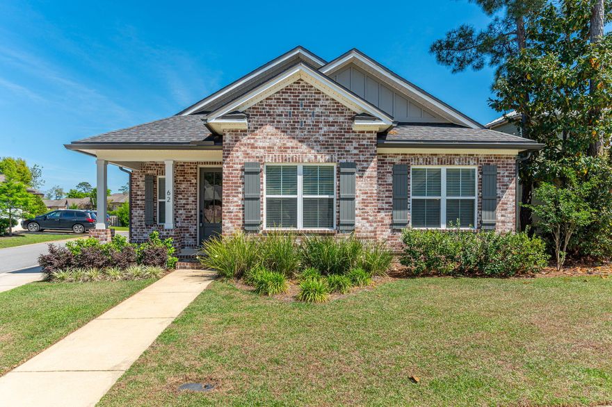 Welcome to 62 Pintail Blvd, where you get the Randy Wise layout, quality, & finishes you have been searching for without the wait. Exceptional 4 bedroom, 2.5 bath home offers an open living space with a shiplap fireplace, crown molding, & natural light throughout. You'll love a kitchen designed for real life, with quartz countertops, stainless steel appliances, & space to gather. Your primary suite is privately tucked away with a walk in closet, double vanity, garden tub, and separate shower. Additional bedrooms are well sized, and the built in bunk area adds flexible space for guests or storage. Outside, enjoy low maintenance living. In Marina Village, you have marina access, a short walk to the playground & in-ground pool, all with desirable HOA fees in a quiet, no thru-traffic setting.