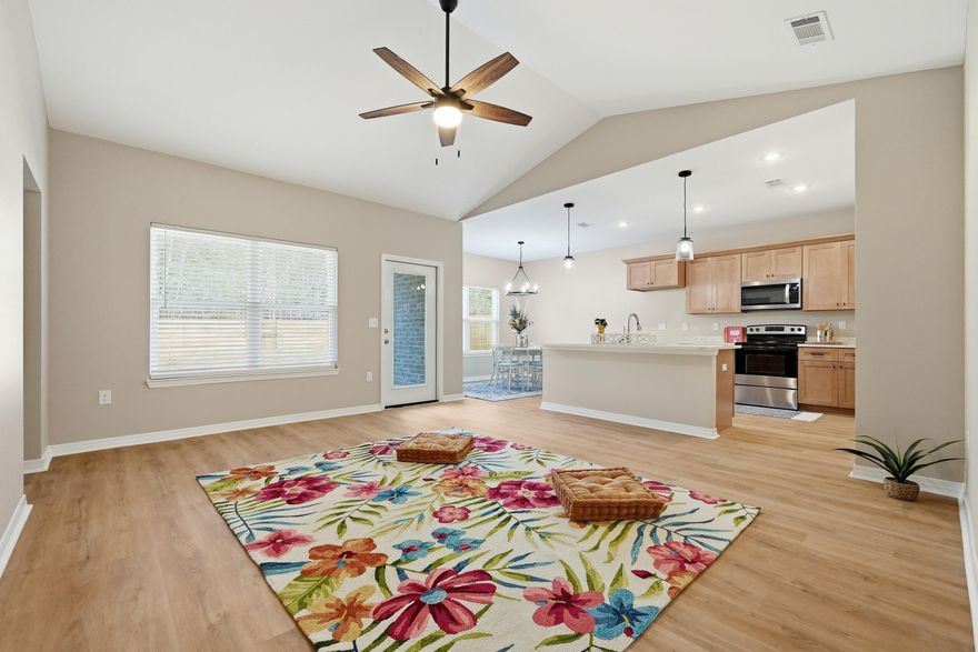 Move-in ready and built to impress--this beautifully crafted home delivers quality, comfort, and value all in one. Situated on a spacious lot, the full brick exterior sets the tone for durability and timeless appeal. Inside, an open-concept layout welcomes you with LVP flooring throughout, a bright living space, and a designer kitchen featuring quartz countertops, center island, and seamless flow into the dining area. The split floor plan offers privacy, with a spacious primary suite boasting dual vanities and a walk-in closet, while guest bedrooms are generously sized. Added value comes standard with installed window blinds, a 6' privacy fence, and a $10,000 seller credit toward closing costs. Complete with a 2-car garage and 1-year builder warranty--this one checks every box. Included features; Window Binds in every room and a 6' privacy fence. Added Bonus $10,000 toward buyer closing fees!!