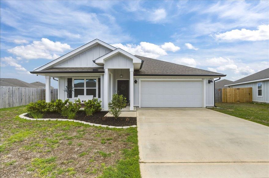 Built in 2023 and thoughtfully enhanced with stylish, modern updates throughout! This move-in ready home features LVP flooring throughout. The kitchen has been elevated with a beautiful tile backsplash and a drop-down light above the island. The dining area stands out with charming beadboard paneling and additional modern wall accents that complete the space perfectly. Both bathrooms have been upgraded with new light fixtures, and the spare bathroom features a striking board and batten accent wall, upgraded lighting, and a sleek sliding glass shower door. Step outside to enjoy a spacious backyard, ideal for entertaining, pets, or creating your own garden oasis. The screened-in patio offers a relaxing space to unwind, with plenty of room to make the outdoor area your own!