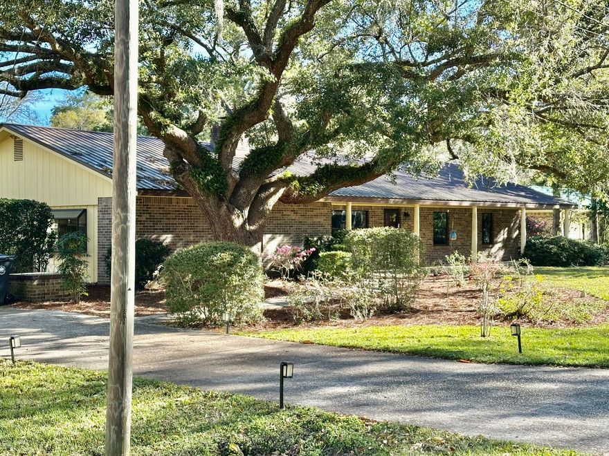 WATERFRONT! FISHERMAN'S PARADISE!  This one story three bedroom two and half bath brick home offers over 2200 square feet of heated and cooled living space.  Walk out the back door and you will find a wide deep water canal that can take you and your watercraft/boat to the fishing and water sports that the Choctawhatchee Bay and Gulf of America have to offer.  Set on nearly a half acre of land, you are located just 10-15 minutes from the white sandy beaches of 30A and all of the dining and boutique shopping it has to offer.  Enjoy the refreshing breezes sitting on your expansive front porch with your morning coffee or an ice cold beverage in the afternoon coming off of the bay.