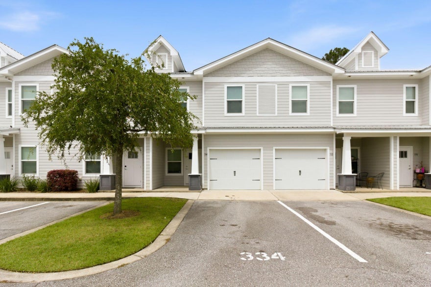 Welcome to 334 N Sand Palm Rd in the sought-after Verandas at Freeport community -- a beautifully designed 3-bedroom, 2.5-bath townhome offering the perfect blend of comfort, style, and convenience. Built in 2021, this two-story home features approximately 1,432 sq ft of living space with an open-concept layout, spacious bedrooms, and a one-car garage. The bright and inviting main living area flows seamlessly into the kitchen, complete with quartz countertops, stainless steel appliances, luxury vinyl plank flooring, and modern finishes throughout. Upstairs, you'll find a generous primary suite with a walk-in closet and private bath, along with two additional bedrooms and a full guest bath. Located just minutes from Freeport schools, shopping, dining, and a short drive to the white-sand beaches of the Emerald Coast, this home offers low-maintenance living in a growing community with neighborhood amenities including a community pool and sidewalks. Whether you're looking for a primary residence, investment property, or coastal retreat, this move-in-ready townhome is an opportunity you won't want to miss.