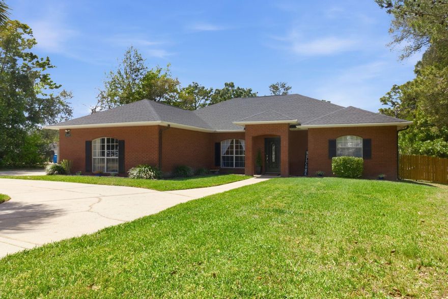 Don't miss this amazing home! Tons of curb appeal with the stately circle drive that leads to your gorgeous home with lots of architectural charm. The driveway connects to a side entry garage and allows for RV or boat parking.Beautiful 18x18 Italian tile throughout the common areas, vaulted ceilings with plenty of natural light coming in through double French doors. 10' ceilings in most of the home where you can enjoy cooking in the stylish kitchen with granite countertops, enjoy your privacy with the split floor plan, and spa like owners suite that offers walk-in  shower and jetted tub, separate vanities and custom walk-in closet.Great for entertaining with your enclosed back porch and expansive deck, cozy fire pit  and massive back yard. New roof 11/2024, HVAC 2021, Hot water heater 2026